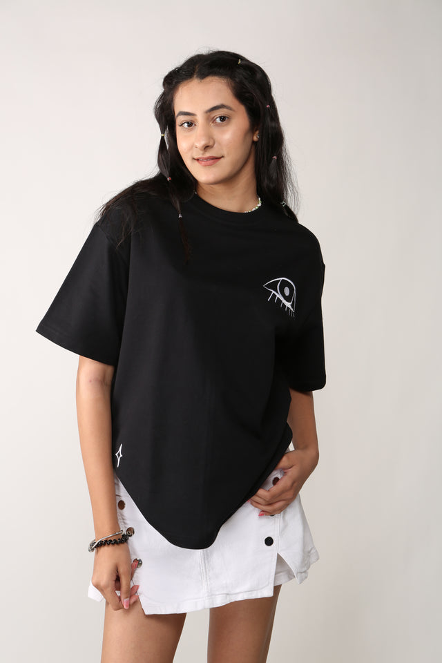 female model wearing unisex cosmic watcher tee from outdrip 