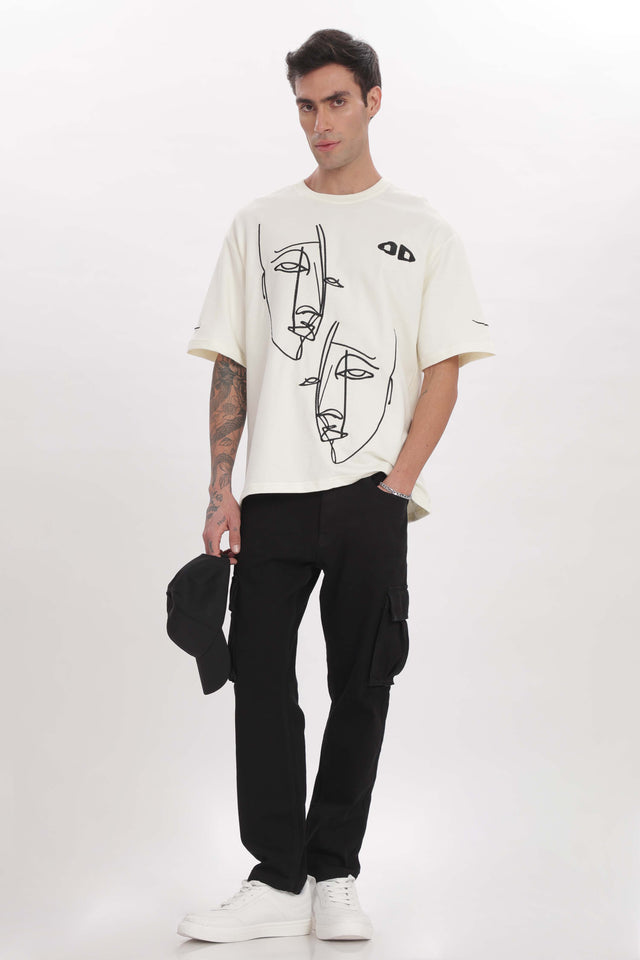 male model wearing unisex fragmented faces tee from outdrip 