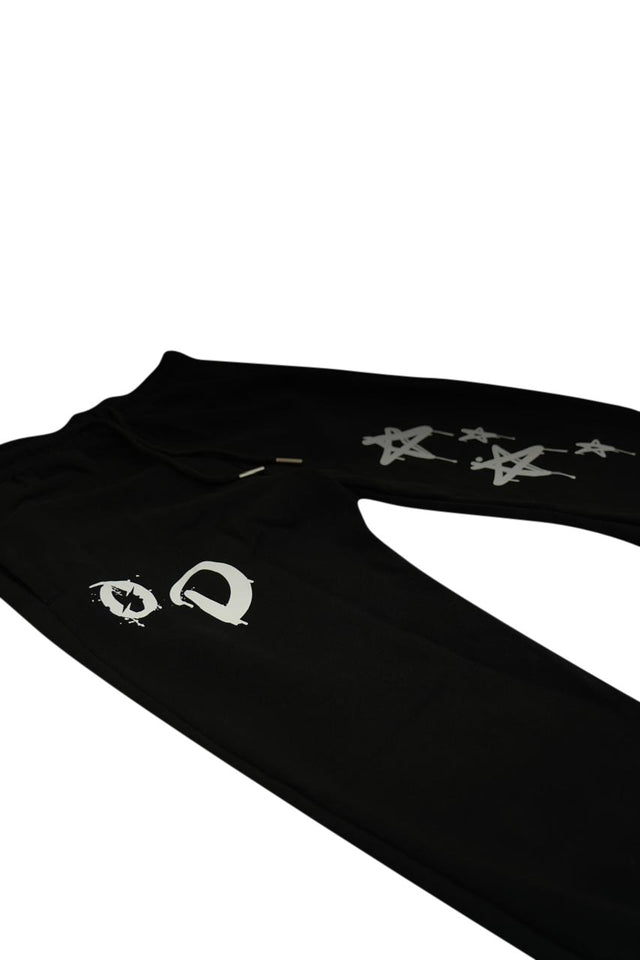 Close-up of STAR JOGGER – soft, breathable 350 GSM fabric with sleek sticker print detailing
